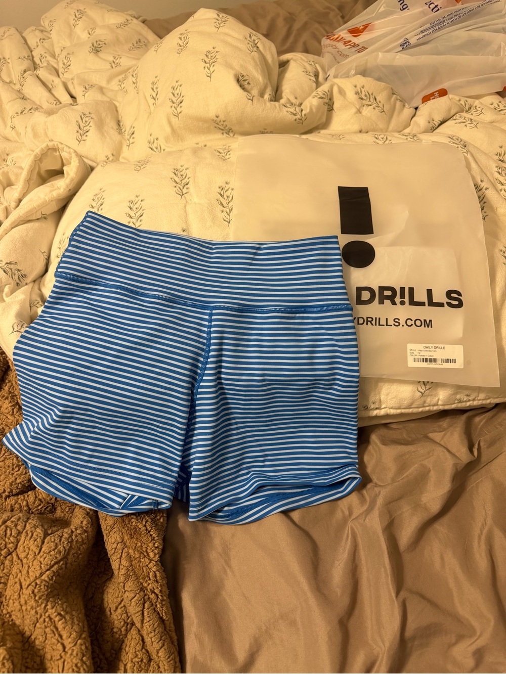 Daily Drills Blue and White Striped Women’s Bike Shorts (will also trade for LG)